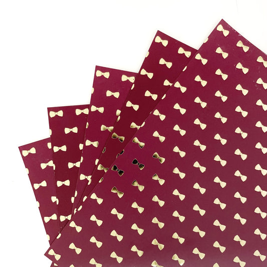 Foiled Paperpack- Wine – Bows – 10 Sheets- 12 x 12 Inch- Gold