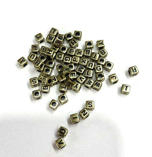 Light Golden alphabets Beads- 25 gm , design -11